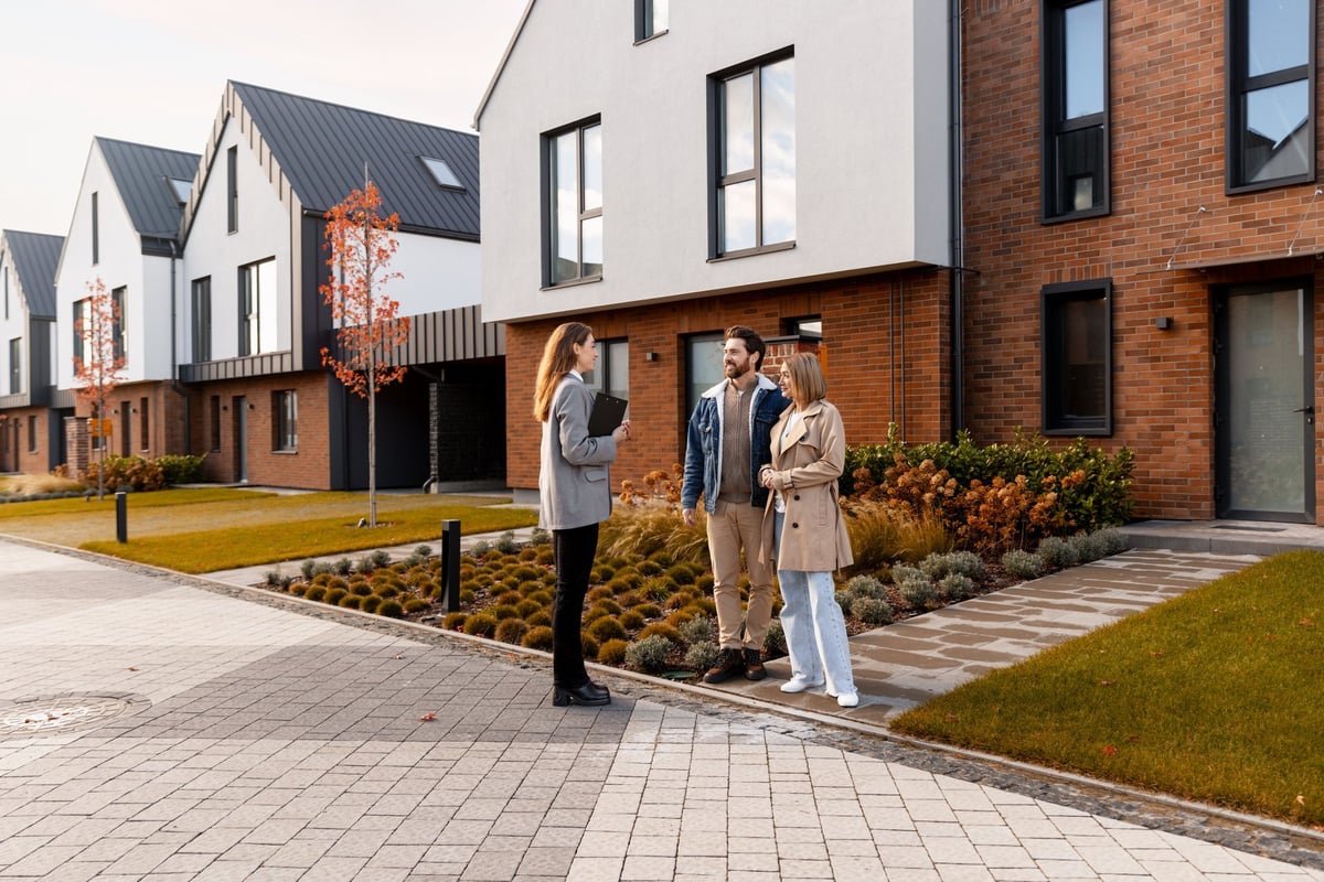Property manager discussing options with a client at a new residence
